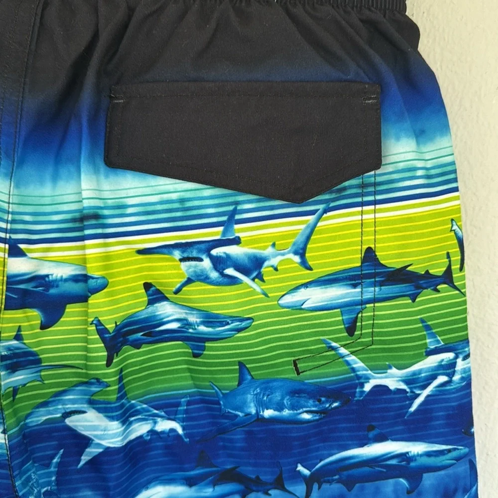 Zero Xposur blue green shark print swim trunks and goggles set size 14/16